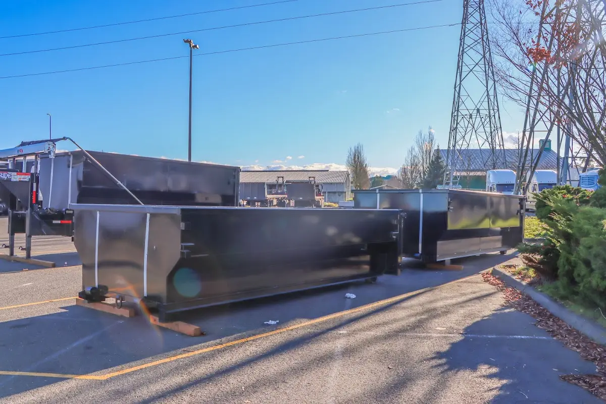 Roll-off dumpster ready for waste disposal at job site for 3 Yard Dumpster Rental in Kittery